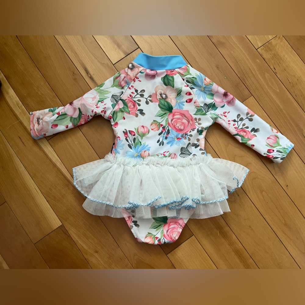 Long sleeved swimsuit (3-6 months)